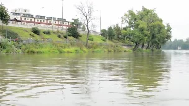 Nature - river with trees and boat - building — Stock Video