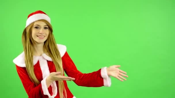 圣诞节 - 假期 - 年轻迷人的女人 - 绿屏 - 女人介绍 — 图库视频影像