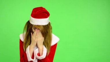 Noel - tatil - genç çekici kadın - yeşil ekran - kadın ağlıyor