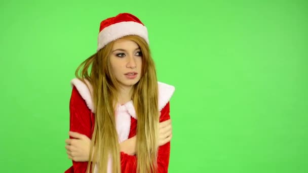 Christmas - Holidays - young attractive woman - green screen - woman shiver cold — Stock Video