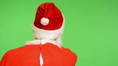 Noel Baba - yeşil ekran - stüdyo - Noel Baba ayakta geri - Noel Baba insanlar seçer ve onları ona davet eden