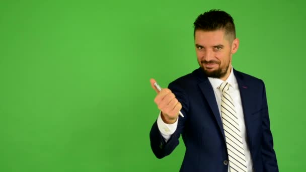 Homme d'affaires avec stylo (signature) - écran vert - studio — Video