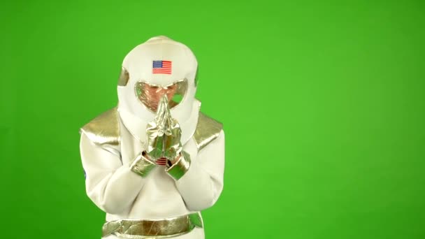 Astronaut bidt - groen scherm — Stockvideo