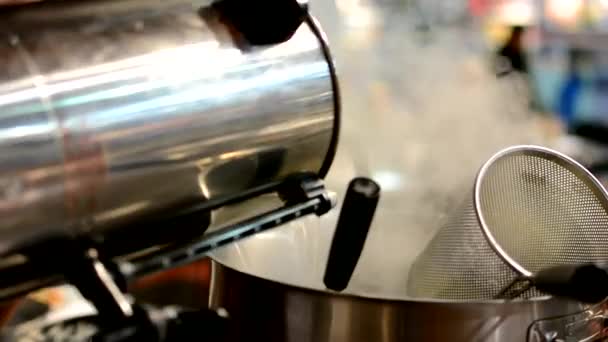 Chef pours water into the pot — Stock Video