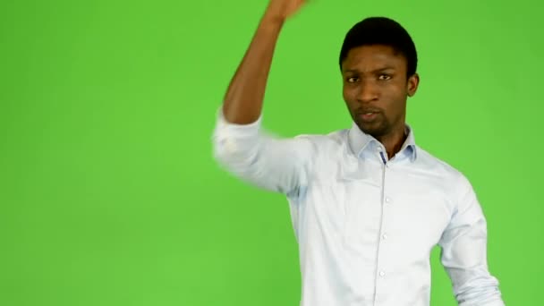 Young handsome black man protests - green screen - studio — Stock Video