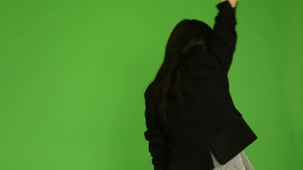 Молодая привлекательная азиатка радуется (спина) - студия зеленого экрана — стоковое видео