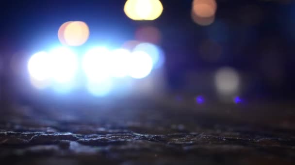 Night city - night street with cars - lamps - car headlight - soft blurred - shot from ground — Stock Video