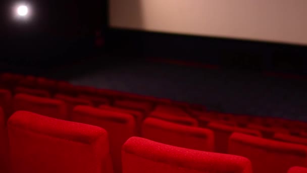 Siège cinéma - rangée - écran de film en arrière-plan — Video