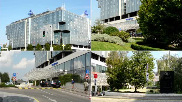 PRAGA, REPÚBLICA CHECA - 20 DE SEPTIEMBRE DE 2014: Montaje 4K (compilación) - Hotel Hilton moderno - exterior - entrada - coches y personas — Vídeo de stock