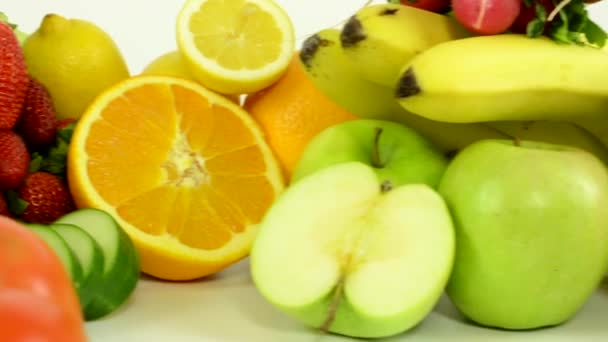 Healthy food - vegetables and fruits - white background studio - closeup — Stock Video