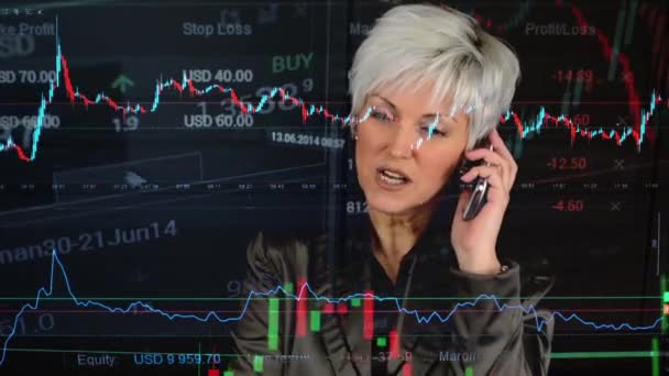 Business middle aged woman phone - financial market (exchange) - graph — Stock Video