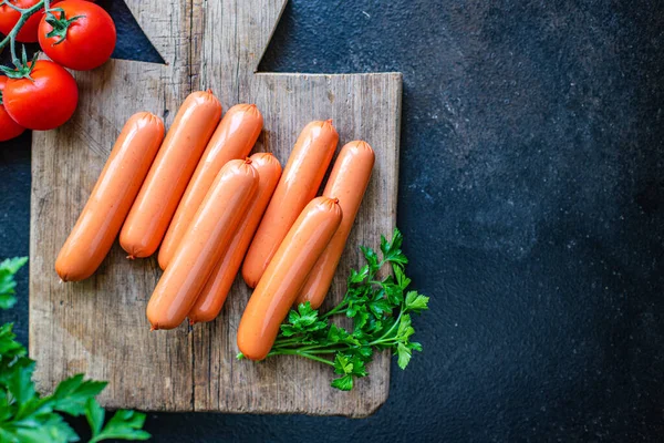 meat sausages pork, beef or chicken ready to eat healthy meal snack natural ingredient top view copy space for text food background rustic