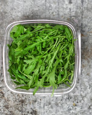 close up fresh arugula leaves 