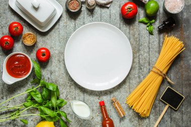 top view ingredients for pasta, spices, herbs, vegetables