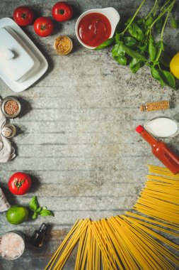 top view ingredients for pasta, spices, herbs, vegetables