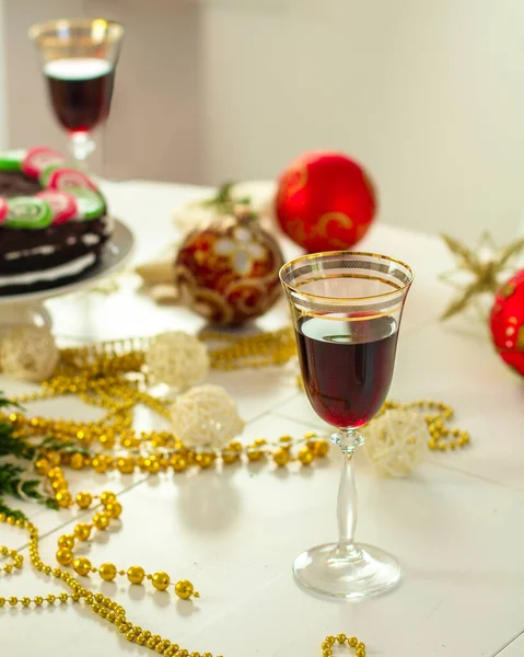 red wine and cake, table served for christmas dinner