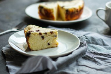 close-up view of delicious piece of cake with chocolate on plate