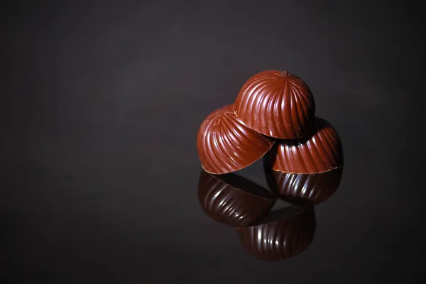 Close View Sweet Delicious Chocolate Candies Black Background — Fotografia de Stock