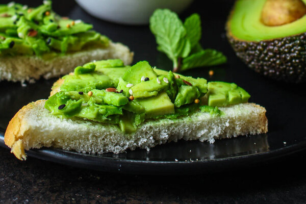 avocado sandwich with cucumber and green peas