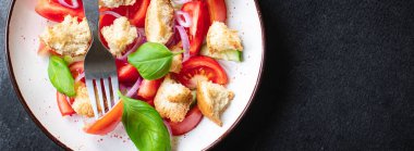 panzanella tomato salad veggie croutons, olive oil, rusk vegetable healthy food meal snack copy space food background keto or paleo diet