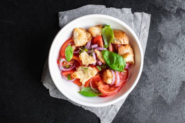 panzanella tomato salad veggie croutons, olive oil, rusk vegetable healthy food meal snack copy space food background keto or paleo diet