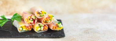 spring rolls Nem vegetables in rice paper organic dish on the table healthy food meal snack copy space food background rustic. top view keto or paleo diet veggie vegan or vegetarian food