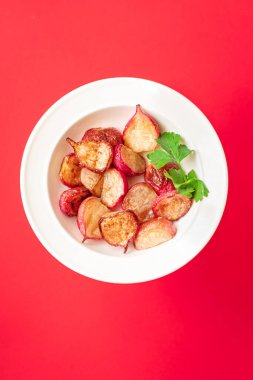 radish fried recipe vegetable diet veggie vegan or vegetarian food on the table healthy food meal snack keto or paleo diet copy space food background rustic top view 