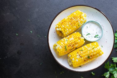 Mısır koçanı ızgara, fast food, atıştırmalık fotokopi arka plan, kırsal üst görüş keto veya paleo diyet vejetaryen ya da vejetaryen yemeği. 