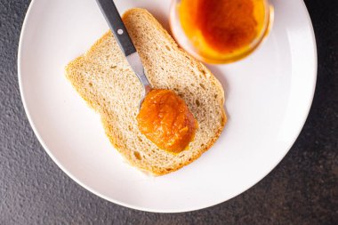 Balkabağı reçeli tatlı tatlı sonbahar konserve yiyecek hasat taze porsiyon yemek için hazır yemek fotokopisi arka plan kırsalında. Top view keto ya da paleo diyet vejetaryen ya da vejetaryen  