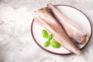 hake ham balık beyaz fileto taze deniz ürünleri yemek için hazır sofra üzerinde yemek fotokopisi uzay yiyecek arka plan kırsal keto veya paleo gıda pesseeter diyet