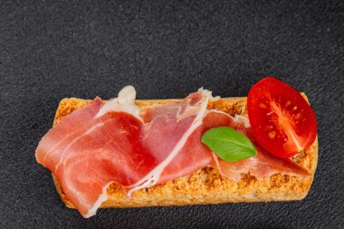 jamon bruschetta prosciutto appetizer portioned tapas dish natural tasty snack fresh delicious gourmet food background on the table rustic top view copy space
