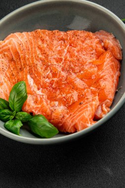 Salmon fillet raw red fish seafood dish natural tasty snack fresh delicious gourmet food background on the table rustic top view copy space pescetarian diet
