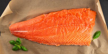 Salmon fillet raw red fish seafood dish natural tasty snack fresh delicious gourmet food background on the table rustic top view copy space pescetarian diet