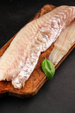 Fileto morina balığı deniz mahsulleri yaygın ling doğal ürün lezzetli aperatif lezzetli lezzetli gurme yemek arkaplan masa üzerinde rustik üst görünüm fotokopi alanı pesseeter diyet