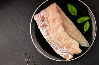 Fileto morina balığı deniz mahsulleri yaygın ling doğal ürün lezzetli aperatif lezzetli lezzetli gurme yemek arkaplan masa üzerinde rustik üst görünüm fotokopi alanı pesseeter diyet