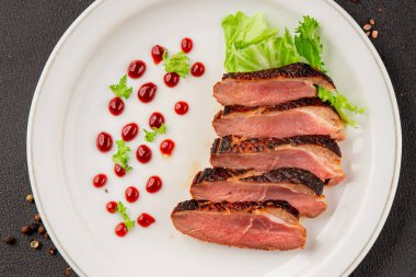 Duck breast roast poultry fresh natural product tasty snack delicious gourmet food background on the table rustic top view copy space