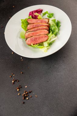 Duck breast roast poultry fresh natural product tasty snack delicious gourmet food background on the table rustic top view copy space