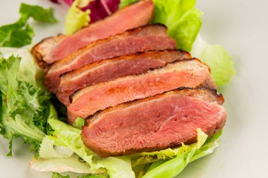 Duck breast roast poultry fresh natural product tasty snack delicious gourmet food background on the table rustic top view copy space