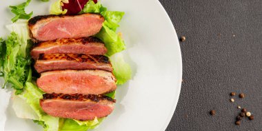 Duck breast roast poultry fresh natural product tasty snack delicious gourmet food background on the table rustic top view copy space