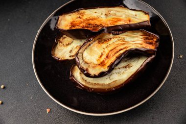 Baked eggplant grilled vegetables fresh natural product tasty snack delicious gourmet food background on the table rustic top view copy space keto and paleo diet vegan and vegan food