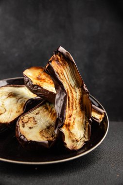 Baked eggplant grilled vegetables fresh natural product tasty snack delicious gourmet food background on the table rustic top view copy space keto and paleo diet vegan and vegan food