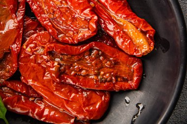 Sun-dried tomatoes snack vegetables natural product tasty snack fresh delicious gourmet food background on the table rustic top view copy space keto and paleo diet vegan and vegan food