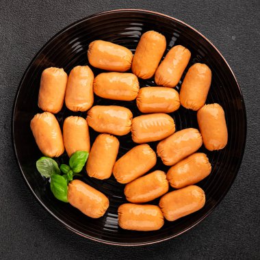 Sosis mini et porsiyon fast food doğal ürün lezzetli lezzetli gurme yemek arkaplan masa rustik üst görünüm fotokopi alanı