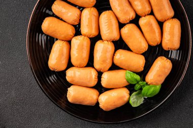 Sosis mini et porsiyon fast food doğal ürün lezzetli lezzetli gurme yemek arkaplan masa rustik üst görünüm fotokopi alanı