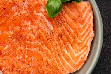 Salmon fillet raw red fish seafood dish natural tasty snack fresh delicious gourmet food background on the table rustic top view copy space pescetarian diet