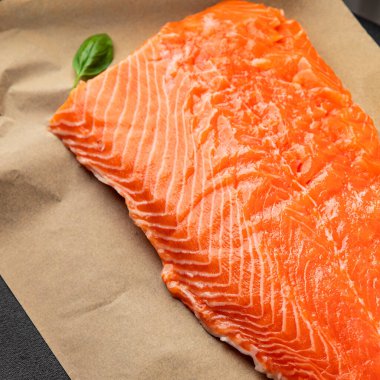 Salmon fillet raw red fish seafood dish natural tasty snack fresh delicious gourmet food background on the table rustic top view copy space pescetarian diet