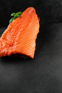 Salmon fillet raw red fish seafood dish natural tasty snack fresh delicious gourmet food background on the table rustic top view copy space pescetarian diet