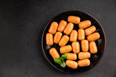 Sosis mini et porsiyon fast food doğal ürün lezzetli lezzetli gurme yemek arkaplan masa rustik üst görünüm fotokopi alanı