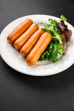 Sosis vejetaryen soya eti, bitkisel gıda, fast food, lezzetli aperatifler, lezzetli gurme yemek arka planı, masadaki rustik üst görünüm fotokopi alanı keto, ya da paleo diyet vejetaryen ya da vejetaryen yemeği.