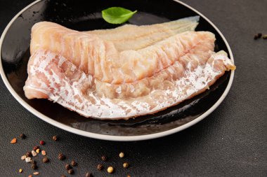 Fileto morina balığı deniz mahsulleri yaygın ling doğal ürün lezzetli aperatif lezzetli lezzetli gurme yemek arkaplan masa üzerinde rustik üst görünüm fotokopi alanı pesseeter diyet